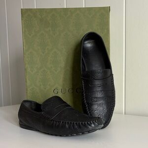 Gucci Embossed Black Leather Men's Slip-Ons
